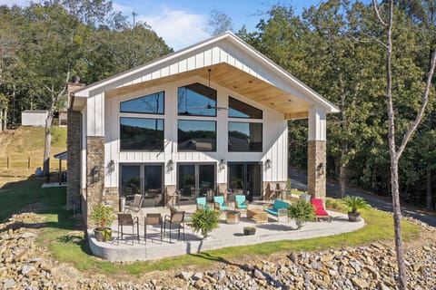 Front. Large porch for entertaining and watching the sun set!