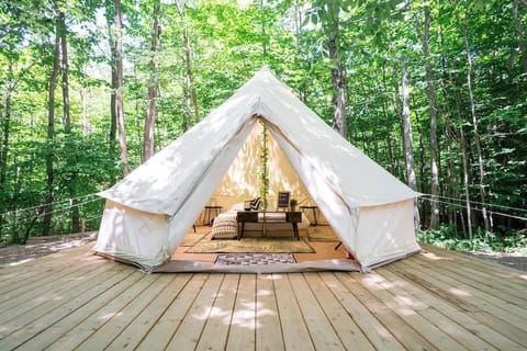 Glamping tent surrounded by nature