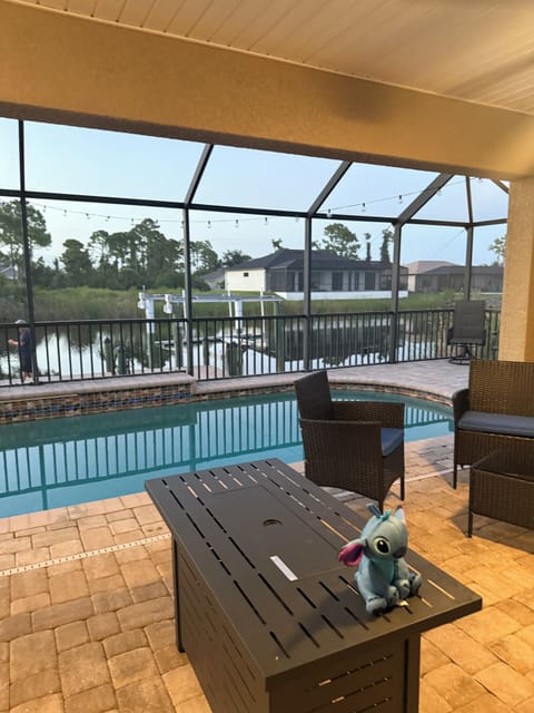 Patio, pool, canal view