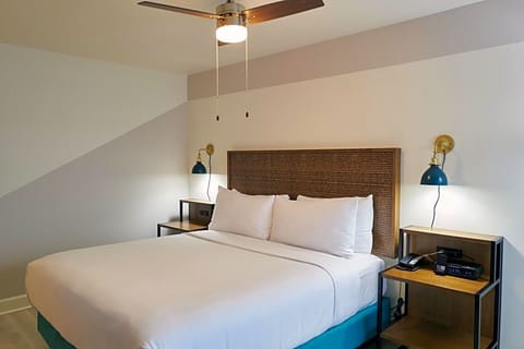 Unwind in crisp linens and a calm, modern retreat.