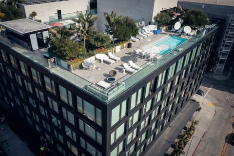 Take in the striking rooftop oasis atop a modern building.