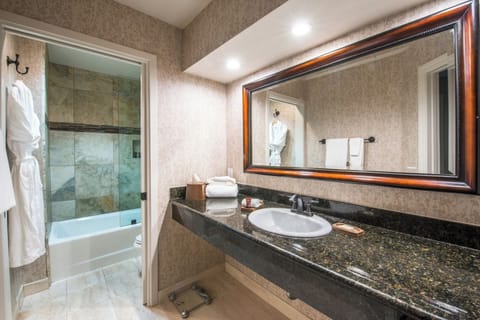 Enjoy a clean, spacious bath with plush towels and deep tub.