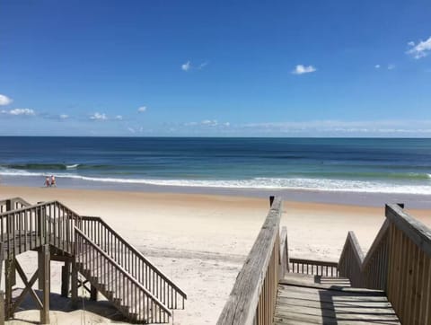 Beautiful Surf City Beach just steps away.  