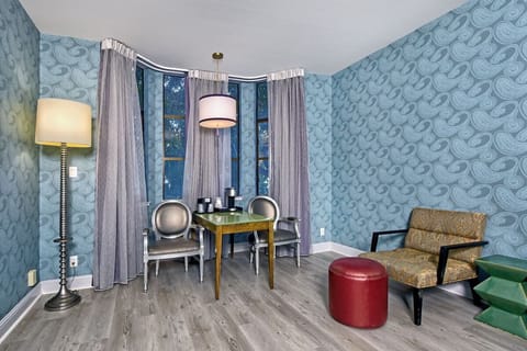 Sip coffee by the bay window in a cozy seating nook.