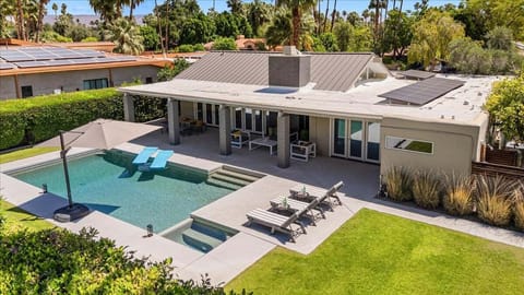 Aerial view showcasing the resort-style backyard and modern design