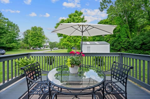 Deck with seating and umbrella