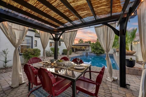 Large Covered patio to entertain, easy access to the kitchen and to the pool