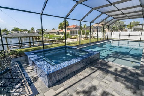 Your dream vacation starts here – soak up the sun by the sparkling pool, enjoy serene waterfront views, and unwind in coastal comfort.