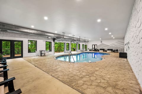 Spacious shared indoor pool with lounge area.