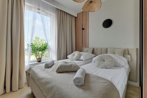 Deluxe Apartment, Balcony | 3 bedrooms, iron/ironing board, free WiFi