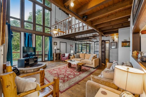 Living Room with Large Windows Overlooking the Mountains