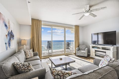 spacious living room with couch sofa and tv