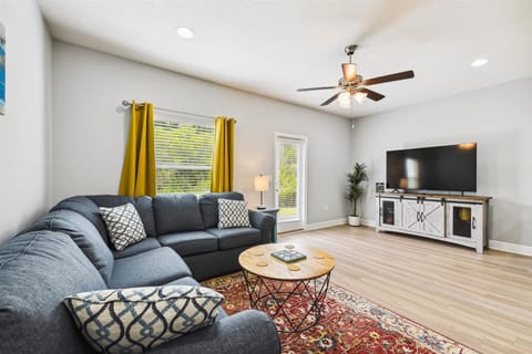 Living Room with sectional and tv