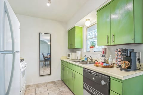 Microwave, toaster, gas stove, dishwasher, pots, pans, utensils,