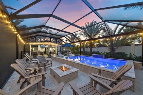 Enjoy a beautiful fire while the kids continue to play in the pool.