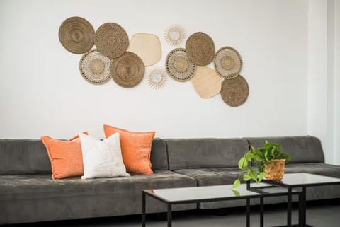 Long, comfy sofa easily fits everyone. Living room accommodates air mattresses. 