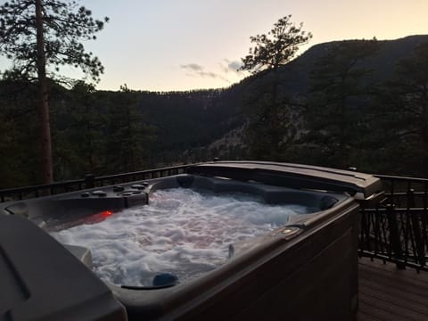 Soak in the hot tub and stare at breathtaking views of the rocky mountains! 