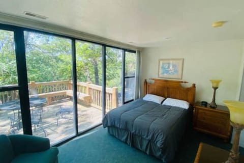 Let the forest be your backdrop.  Cozy up in this serene and naturally lit bedroom retreat.