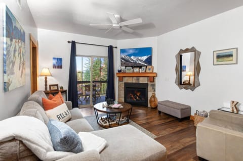 Vacation Rentals in Park City at Bear Hollow 3303: Living room with Queen sleeper sofa, gas fireplace, and private balcony access