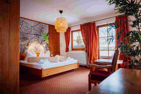 Comfort Quadruple Room, Balcony, Mountain View | In-room safe, free WiFi