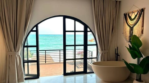 Deluxe Double Room, 1 King Bed, Sea View, Beachfront | Premium bedding, desk, laptop workspace, free WiFi