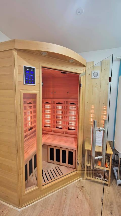 Premium Apartment, 1 Double Bed with Sofa bed, Sauna, Garden View | Bathroom | Hair dryer, slippers, soap, shampoo