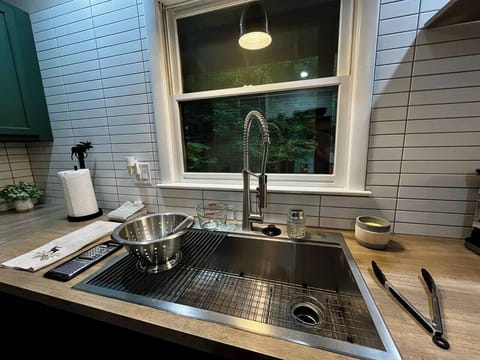 The farmhouse sink makes and ample counter space makes it easy to prepare a meal