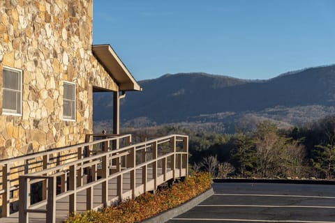 Arrive to a solid stone welcome and breathtaking mountain views.