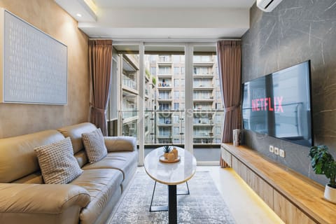 Apartment, 2 Bedrooms, City View | Living area | 55-inch Smart TV with cable channels, Netflix, streaming services