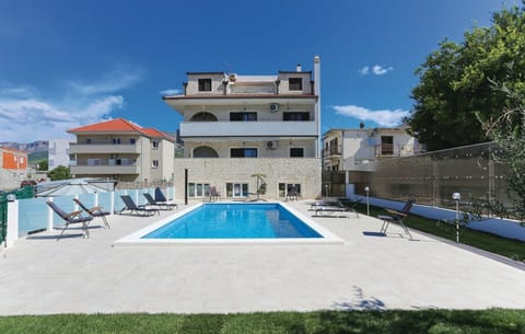 Apartment building with pool