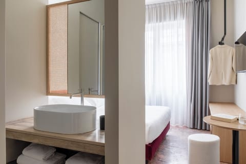 Double or Twin Room | Minibar, desk, laptop workspace, free WiFi
