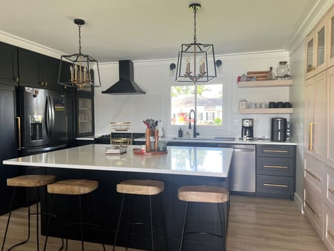 main level kitchen with new zline gas range