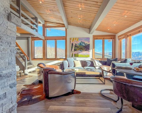 The open-concept living space greets you every time you return from an adventure - bright, comfortable, and setup to feel like your 'home away from home.'