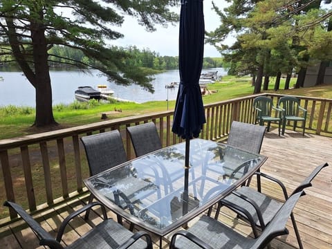 Spacious deck overlooking the beach and lake