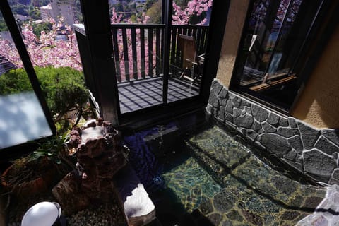 Deluxe Double Room, Balcony, Sea View | Bathroom | Separate tub and shower, spring water tub, hydromassage showerhead