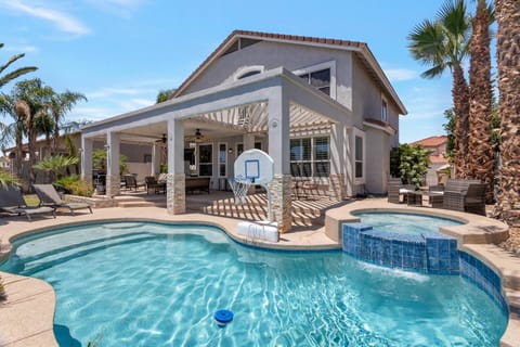 Life is better by the pool! Enjoy the lounge chairs, BBQ grill, gas firepit, pool & hot tub with great views