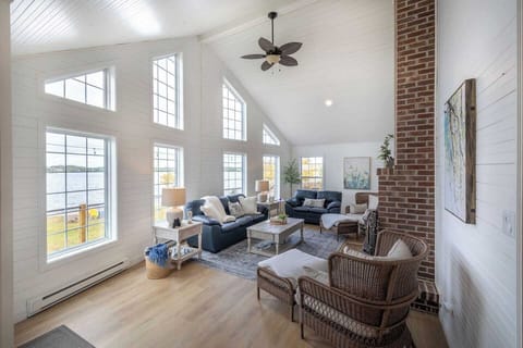 A-frame open concept living room facing pond