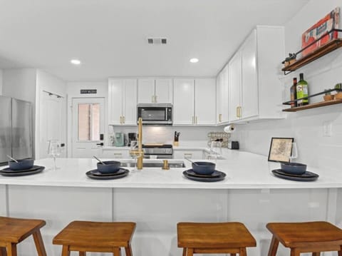 Chef-style kitchen with large island and modern finishes