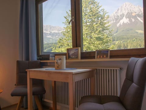 Furniture, Interior Design, Mountain Range, Room, Chair, Hardwood, Wood Stain, Curtain, Alps