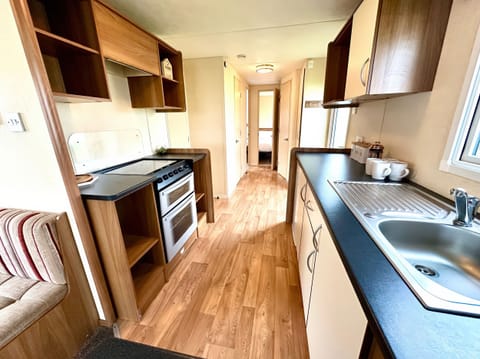 Fridge, toaster, cookware/dishes/utensils