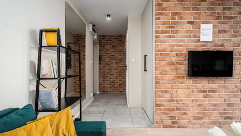 Apartment, Balcony, City View (94) | Living area | Flat-screen TV