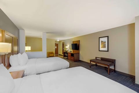 Unwind in a spacious double-queen room with crisp linens.