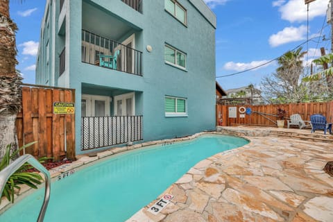 Beautiful heated pool with stone work and new fence.