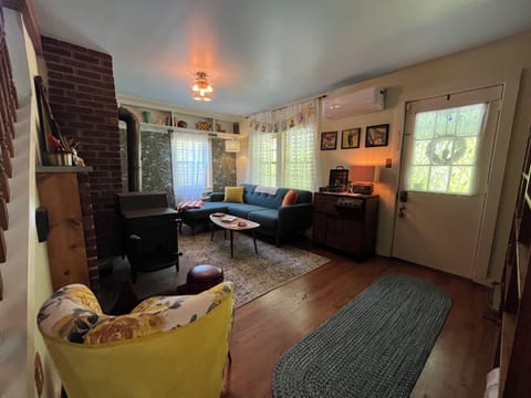 Repose in this adorable, snuggly abode of coziness.