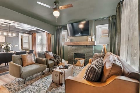 Unwind in style ️ modern comfort with a warm fireplace and chic décor.