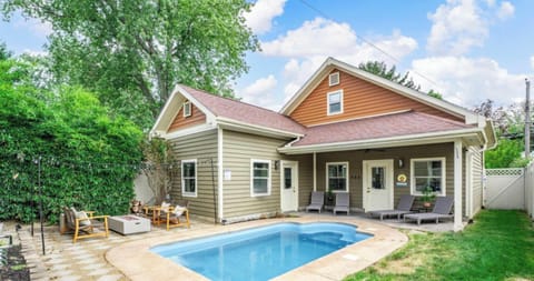 Private backyard pool surrounded by patio space for sunny swims & relaxing afternoons