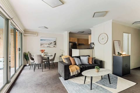 Bright and welcoming open-plan living with seamless flow from lounge to dining and kitchen — the perfect space to relax or entertain.