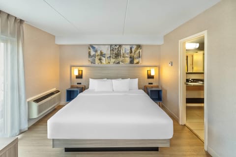 Kitchenette, 1 King Bed, Ground Floor | Premium bedding, pillowtop beds, desk, blackout drapes