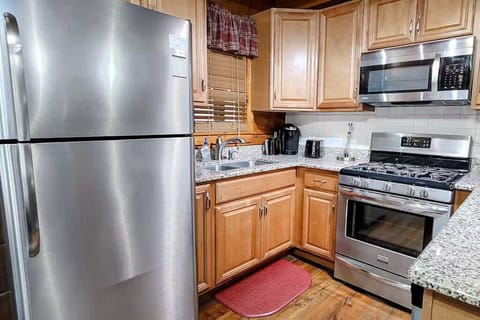 Your Kitchen, complete with modern appliances and granite countertops make meal prep a delight!

