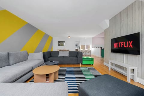 Kick back with Netflix on the big screen after a day exploring the city